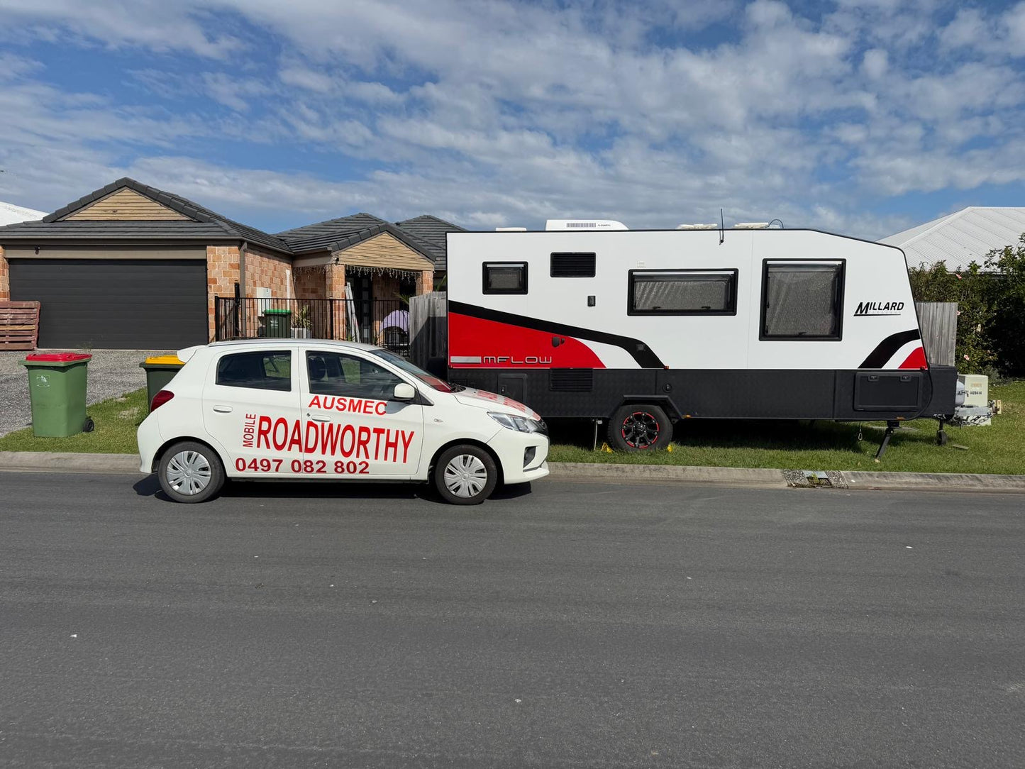 A detailed mobile safety certificate inspection of a Caravan trailer being performed at a customer's home in Newmarket, ensuring it's fully roadworthy.