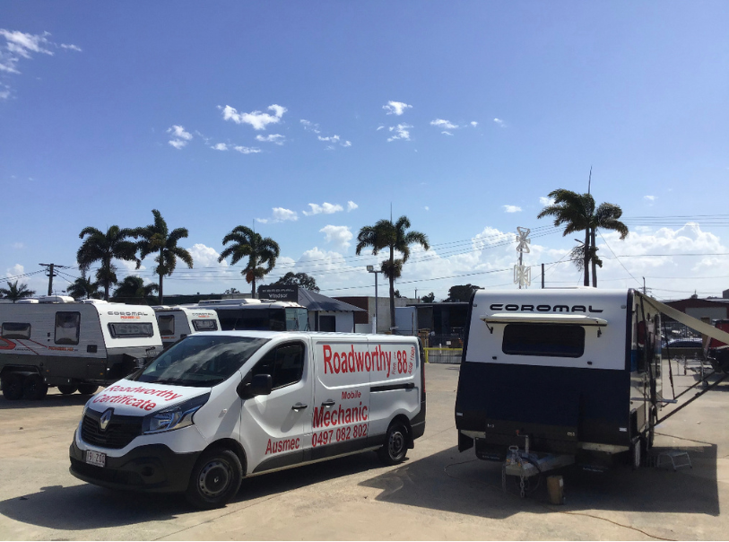 "Your caravan's Taigum Mobile Roadworthy (Safety Certificate), inspected conveniently at the yard." Van and trailer with visible branding on a clear day