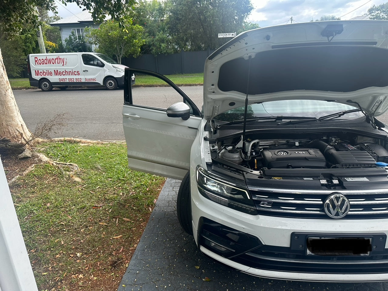 "Our mobile mechanic conducting a comprehensive Scarborough Mobile Roadworthy (Safety Certificate) inspection on a VW Tiguan, checking under the bonnet."