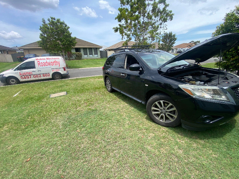 Ausmec Mobile Roadworthy Mechanic performing a car safety certificate inspection on-site in Morayfield
