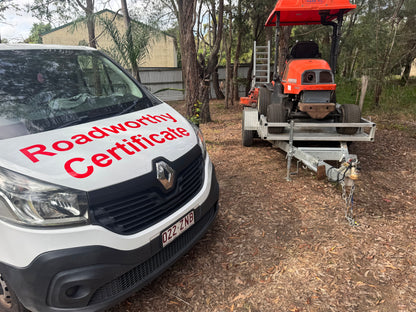 "Comprehensive Kallangur Mobile Roadworthy (Safety Certificate) for a utility trailer, delivered conveniently at the customer's location." White van with 'Roadworthy Certificate' text and a red tractor on a trailer in an outdoor setting.