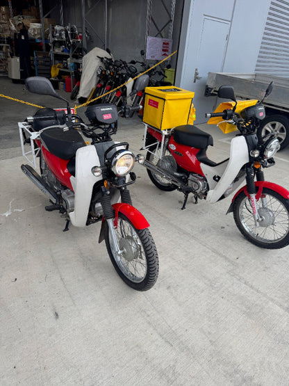 Expert mobile mechanic conducting a motorcycle Roadworthy Certificate (RWC) inspection in Caboolture.