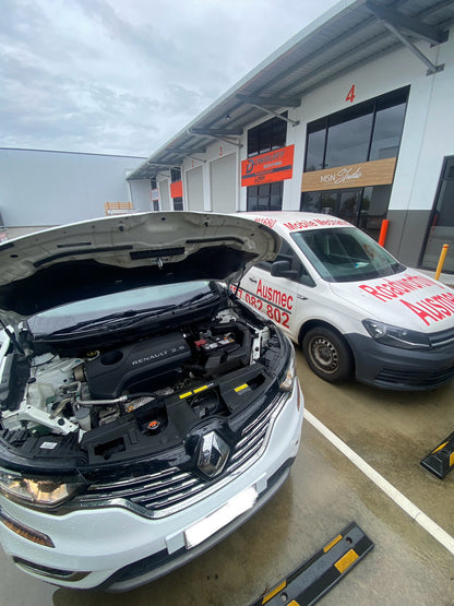 Pre Purchase Car inspection in a customers driveway on a white car
