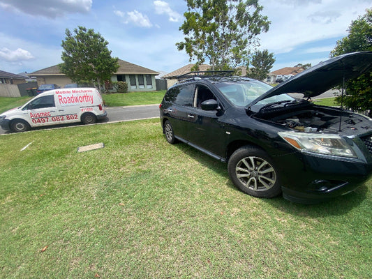 Ausmec Mobile Roadworthy Mechanic performing a car safety certificate inspection on-site in Morayfield