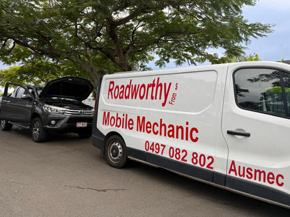 (Car inspection thoroughly): An Ausmec Mobile Roadworthy technician thoroughly inspecting the engine bay of a car, ensuring a comprehensive Virginia mobile roadworthy (safety certificate) assessment. White van with 'Roadworthy Mobile Mechanic' branding next to a black car with an open hood.